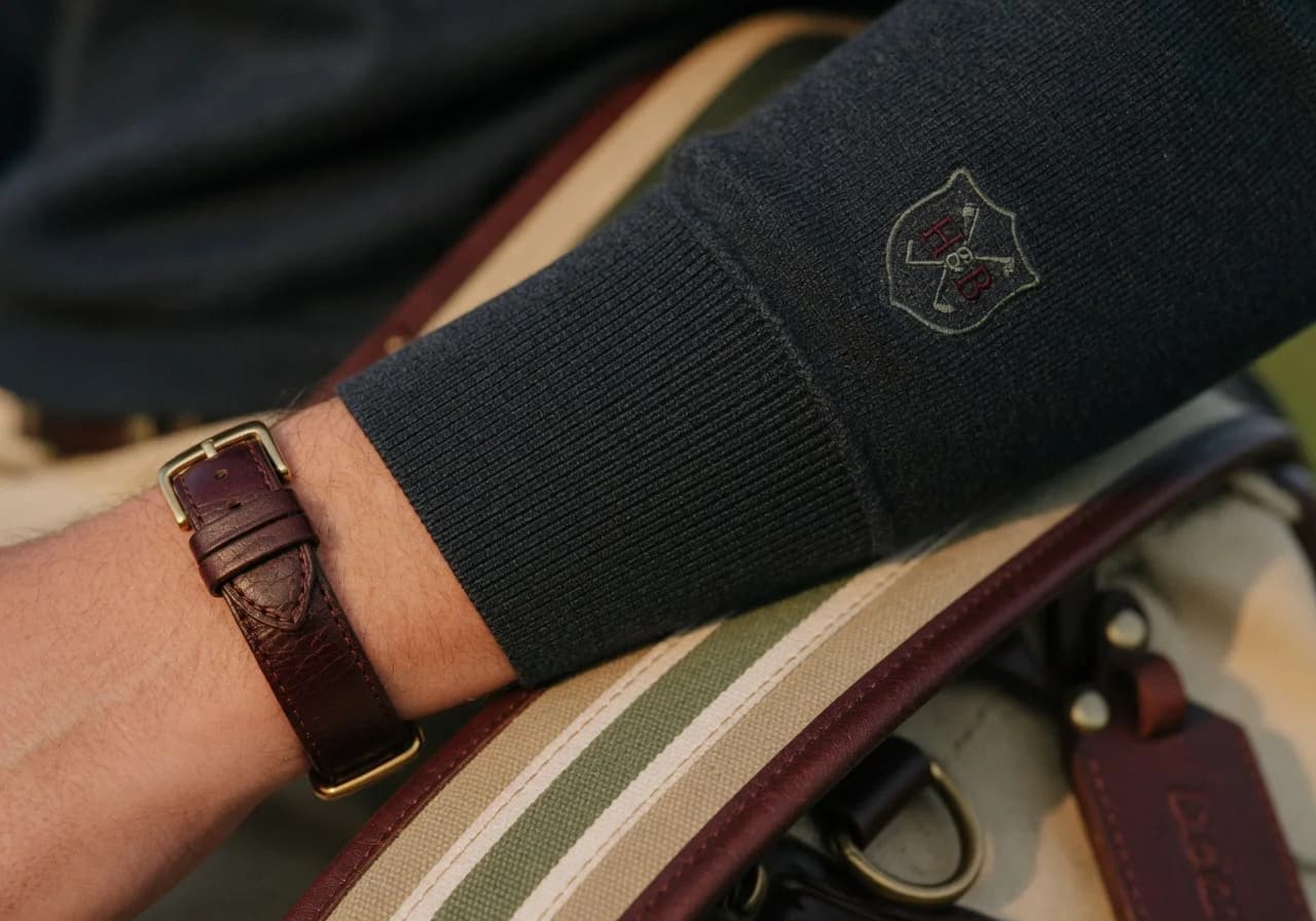 A detail of a merino quarter-zip cuff
